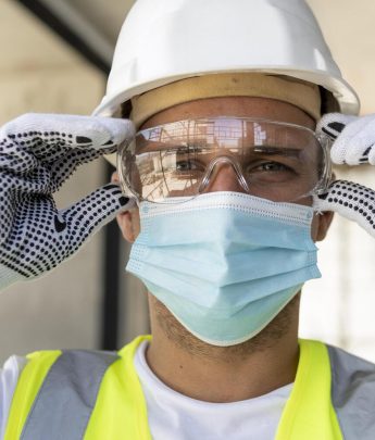 worker-wearing-safety-glasses-on-construction-site (1)